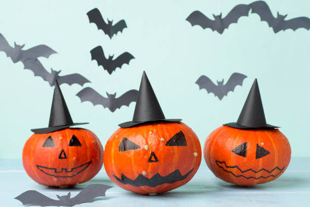 istock Halloween composition with jack o lanter decor on wooden table 2158274179