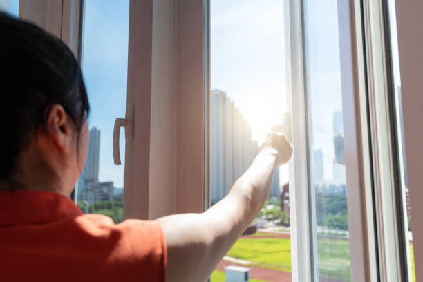 istock Woman hand holding handle and open the window 2158274217