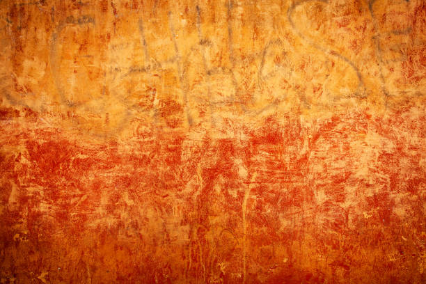 Photo of a red textured grunge style wall surface