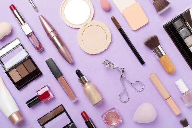 istock Flat lay with makeup products and tools on color background 2158278451