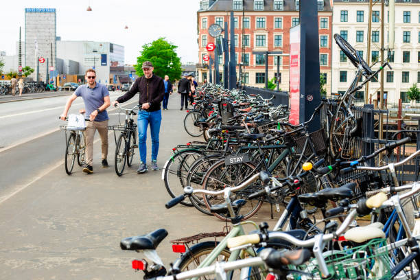 Copenhagen, Denmark - 16 June, 2024: cyclists traversing the bicycle-friendly streets and roads of central Copenhagen, the capital city of Denmark.