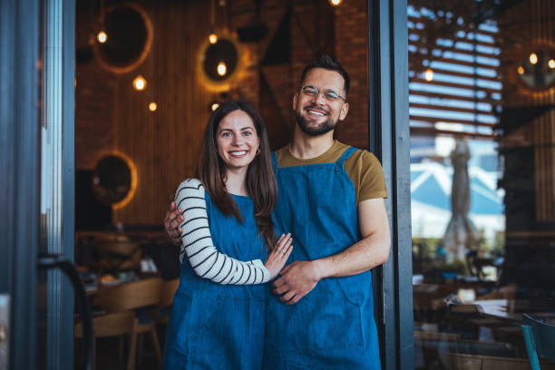 istock Friendly Caucasian Baristas in a Coffee House 2158284990