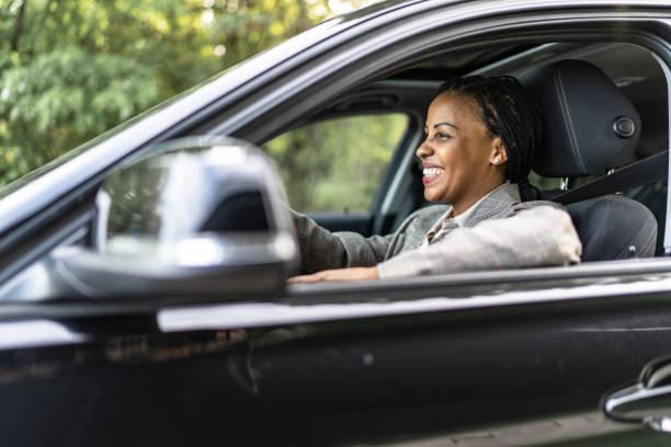 istock Businesswoman driving a car 2158285191