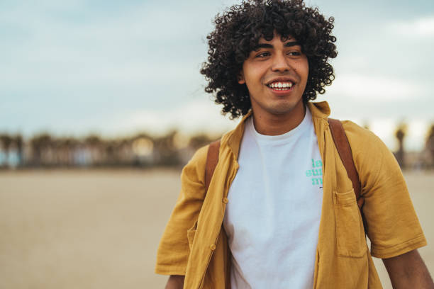 istock Joyful Hispanic Male Enjoys Coastal Setting 2158285276