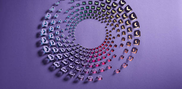 istock Mesmerizing Spiral of Multicolored Paper Cutouts Casting Shadows on a Purple Surface 2158286137