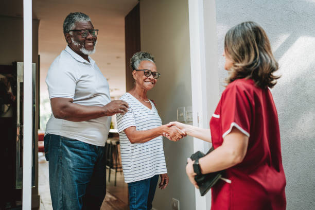 istock Nurse home visits elderly couple 2158288219