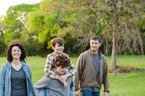 istock Family takes nature walk in evening 2158291477