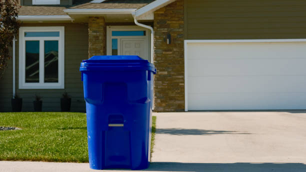 Blue Recycling Bin in front of house