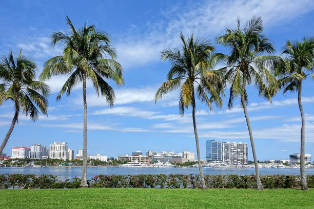 West Palm Beach Skyline West Palm Beach, Florida, USA - May 25, 2024: West Palm Beach skyline as seen from Palm Beach looking over the intracoastal waterways. west palm beach fl stock pictures, royalty-free photos & images