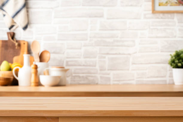 istock Wooden table top on blurred kitchen at background. Ideal for product display 2158295506