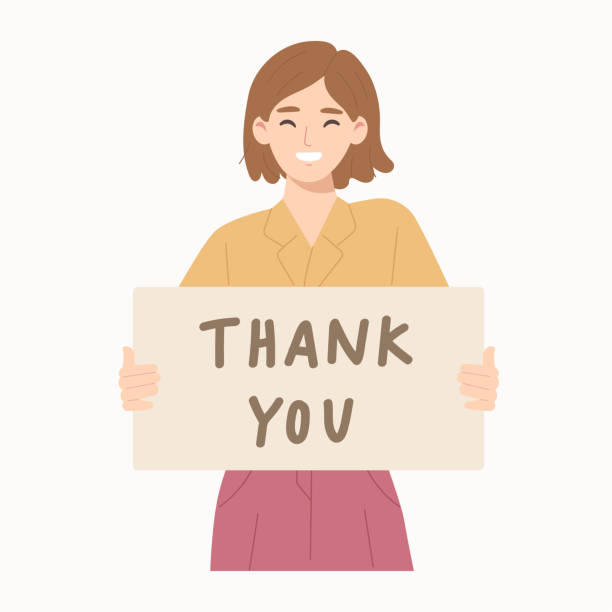 istock Young cheerful woman smiling and holding card with 