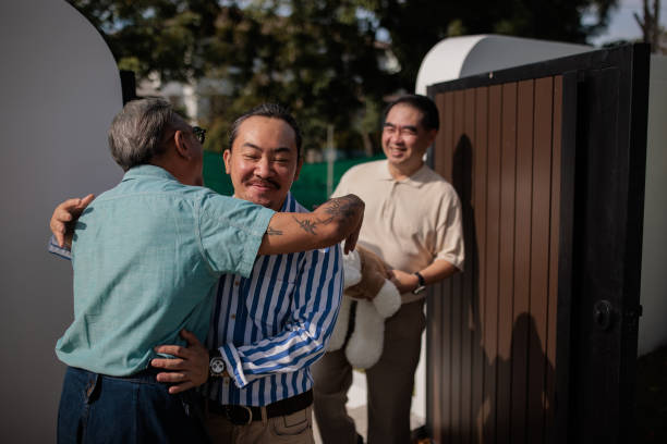 istock Man greeting his friends 2158301118