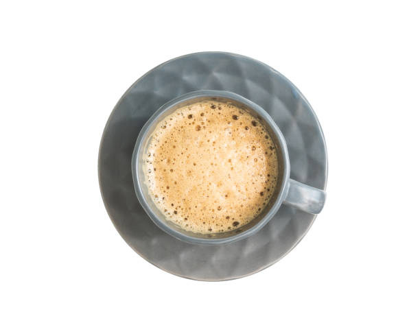 istock A cup of coffee on a saucer placed on a plain white background 2158304105