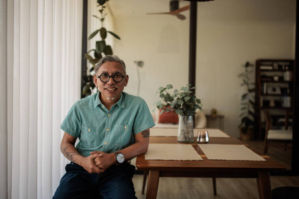 istock Charming Thai man at home 2158304960