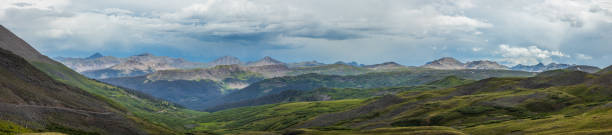 istock tundra hills panorama with distant mountains and rain cloud sky 2158305145