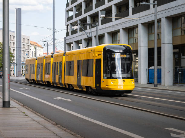 Dresden, NGT DX DD railcar 2905 on line 2 to Gorbitz. The new yellow tram is part of the public transportation in the city. The DVB is running the transport company.