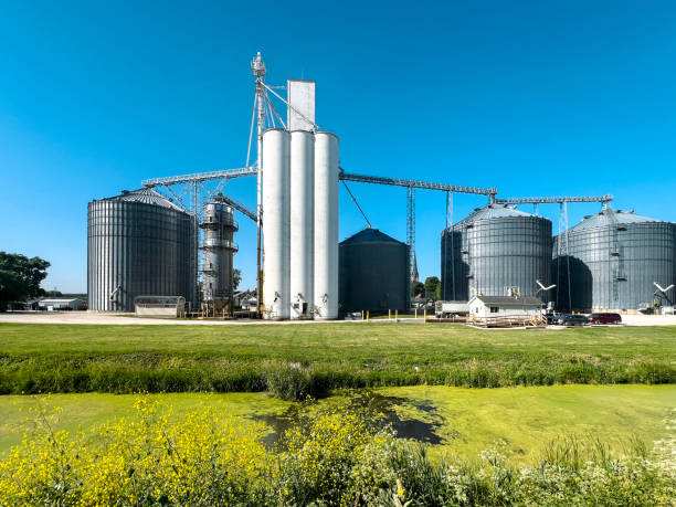 istock Agricultural Grain Elevator Along a Canal 2158319538