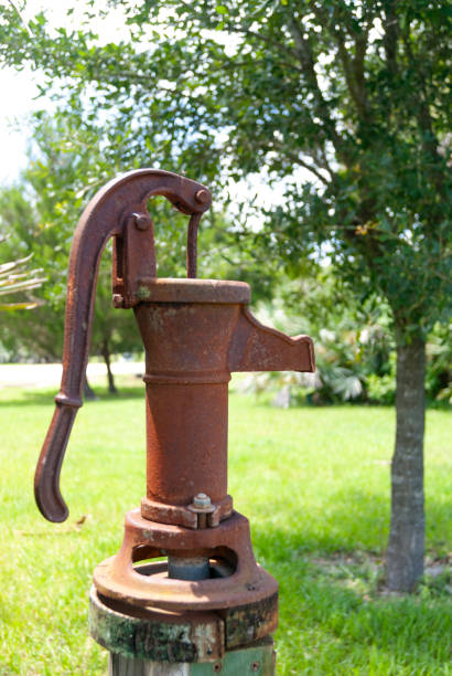 istock Old Water Pump in Garden 2158322035