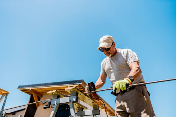 istock Senior man carpenter using electric saw in a house backyard 2158322887
