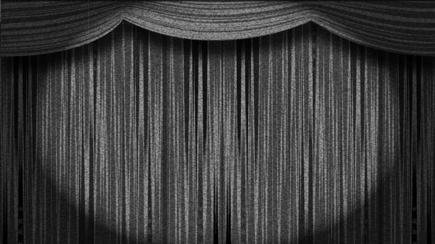 Vector illustration of a Black and white retro Silent Film Title Screen background with closed stage curtains spotlight sample text lot's of grain texture 4k aspect ratio. Lot's of texture, fully editable.