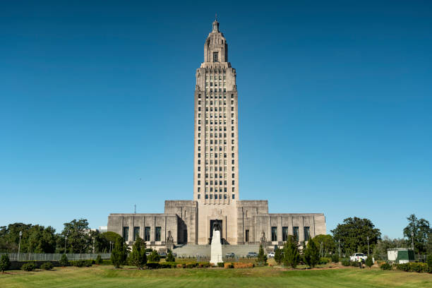 Louisiana State Capitol Building exterior located on the eastern bank of the Mississippi River.  Baton Rouge is the capital city of the U.S. state of Louisiana