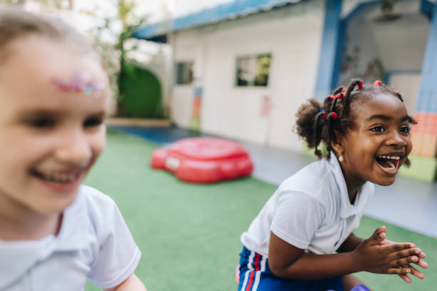 istock Girl having fun at school playground 2158326849