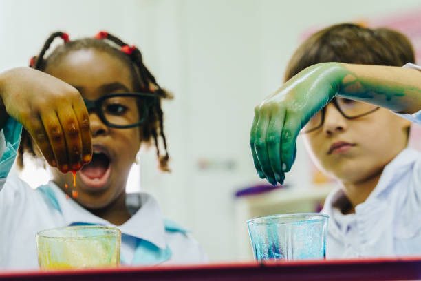 Children conducting a scientific experiment in the school laboratory