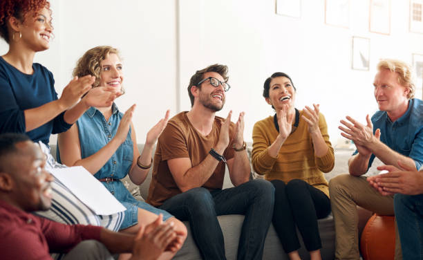 istock Creative, business and people clapping or happy for target achievement, applause and presentation in workshop. Crowd, diverse group and smile or project success, celebration and web designer together 2158329974
