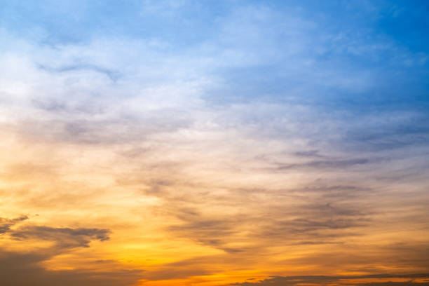 istock Beautiful , luxury soft gradient orange gold clouds and sunlight on the blue sky perfect for the background, take in everning,Twilight, Large size, high definition landscape photo 2158332324