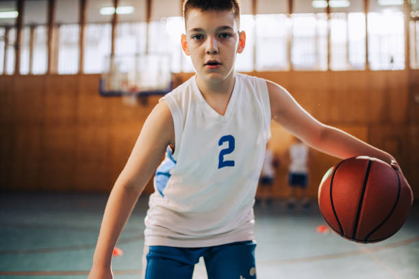 istock Young basketball player focused on the game 2158334201