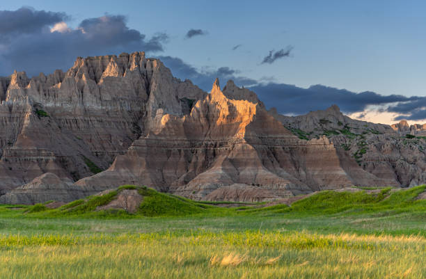 istock Vibrant Sunset Over the Beautiful Geological Rock Formations Around Cedar's Pass in Badlands National Park in South Dakota USA 2158334839