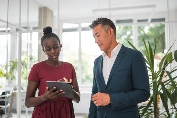 istock Diverse Business Partners with Digital Tablet 2158336459