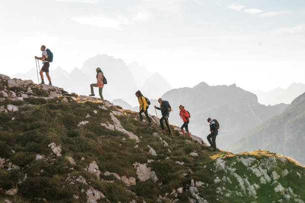 istock Diverse Friends Having Fun on Mountain Ridge 2158336493