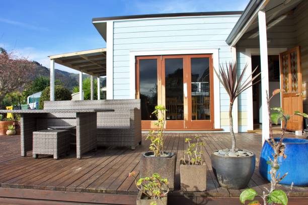 istock Bifold Wood Doors and New Clapboard Cladding in Renovation Stage 2158345492