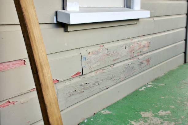 istock Peeling Old Paint on Weatherboard / Clapboard Cladding House 2158345610