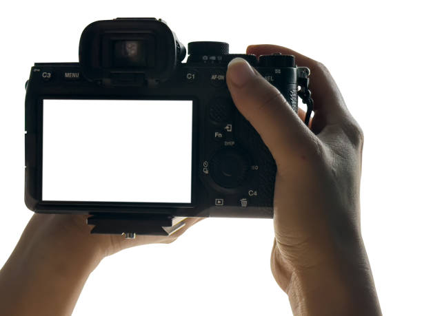 istock Hand holding Mirrorless camera with white screen isolated on white background, clipping path 2158350579