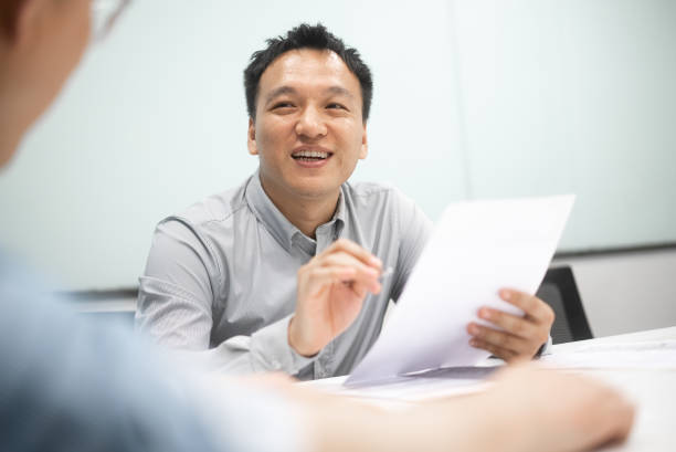 istock person working in meeting room 2158352630