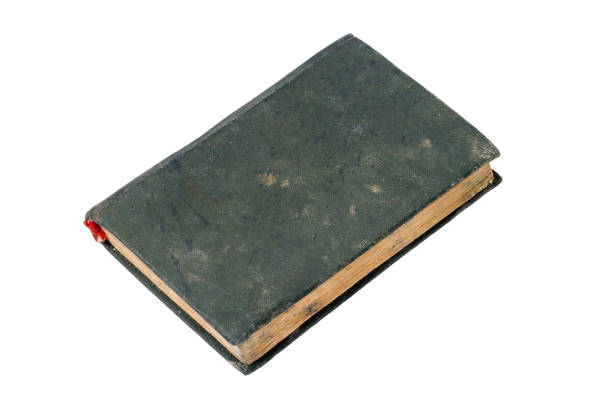 An old dirty book on a white background. The old book is isolated.