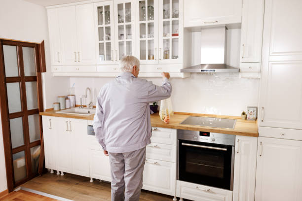 istock Senior man returns home after shopping 2158356906