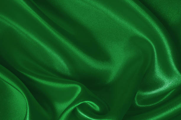 istock Green emerald fabric texture background, detail of silk or linen pattern. 2158358540