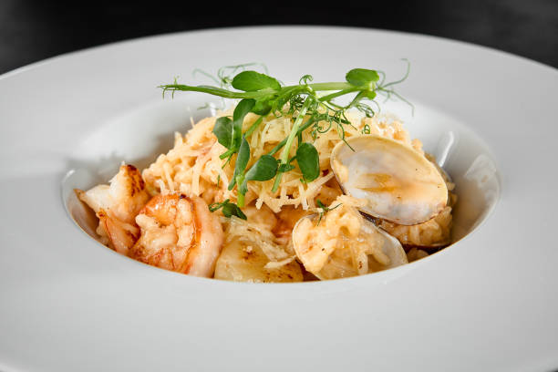 istock Gourmet Seafood Risotto with Scallops and Shrimp 2158358734