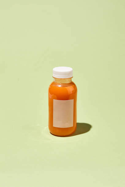 Minimalist Pastel Pattern with Orange Juice Bottle - Creative Colorful Concept