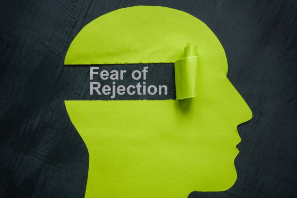 istock Fear of rejection concept. Paper head and torn off piece. 2158361100