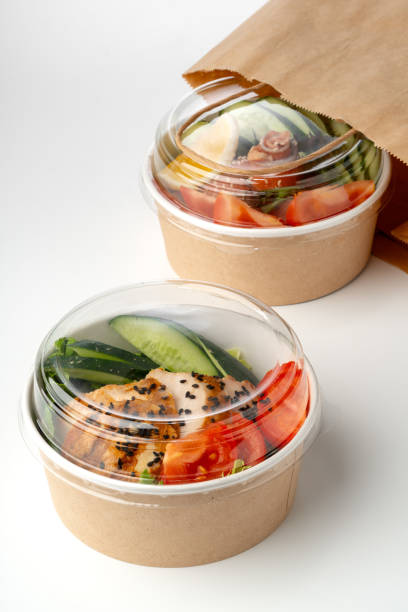 istock Take out poke bowls with craft bag isolated on white background 2158361203