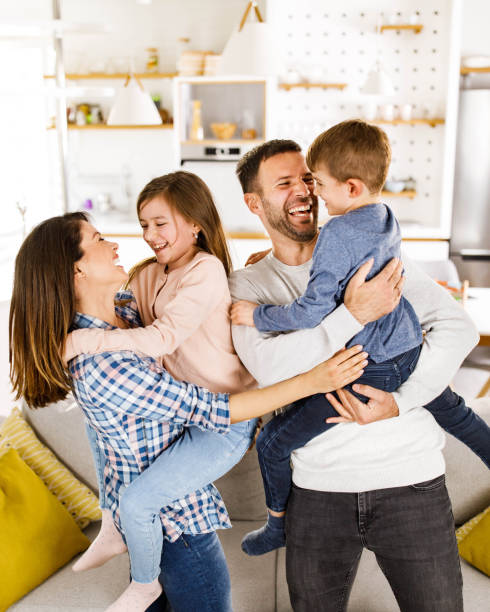 istock Cheerful family having fun together at home. 2158362461