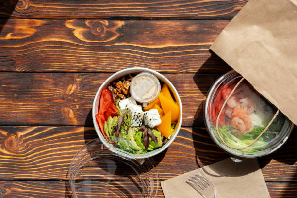 istock Take out poke bowl on wooden background 2158364382
