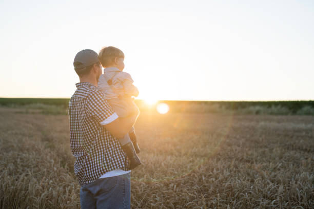 istock Showing my son the fields and the crops. 2158366119