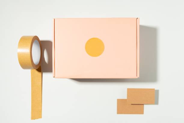 Parcel box, branding sticker, corporate identity flat lay design