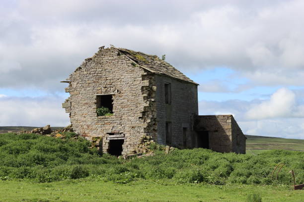 Abandoned farmhouse in remote countryside