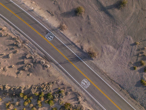 istock Iconic Route 66 Painted on Desert Road 2158372211